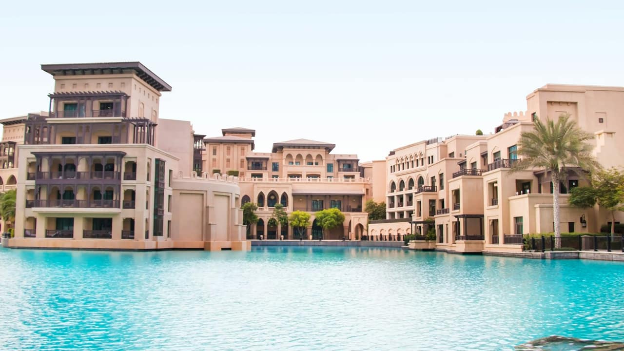 Luxury villa exterior with manicured lawn